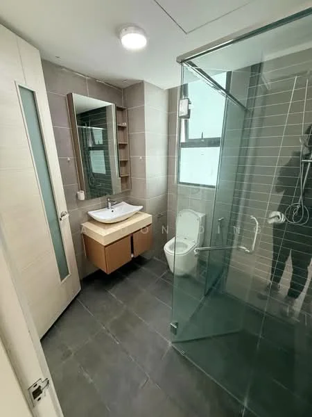 Bathroom features: glass shower enclosure, rain shower head, single-sink vanity with wood cabinet, white ceramic sink, chrome basin mixer, framed mirror, one-piece toilet, grey tiled walls, dark grey tile flooring, built-in shelving, recessed ceiling lights; style: modern.