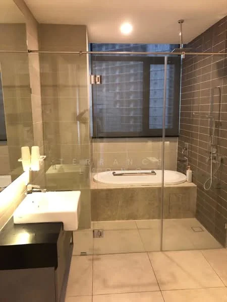 Bathroom features: glass shower enclosure, freestanding bathtub, chrome handheld shower, wall-mounted faucet, single-sink vanity with white cabinet, mirror above vanity, tile flooring, grey accent wall, window with frosted glass, recessed lighting; style: modern.