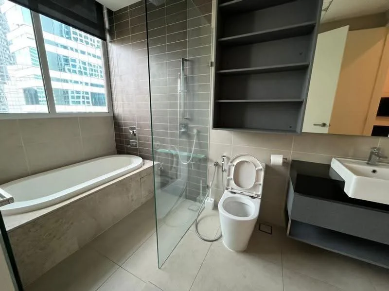 Bathroom features: walk-in shower with glass enclosure, bathtub, single-sink vanity with dark cabinetry, chrome basin mixer faucet, toilet, large mirror, grey tiled walls, light-colored floor tiles, floor-to-ceiling windows, built-in shelving; style: modern; view: city.