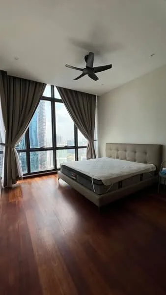Bedroom features: king-size bed, upholstered headboard, floor-to-ceiling windows, grey curtains, wooden flooring, 5-blade ceiling fan, nightstand, decorative wall, city view; style: modern; view: city.