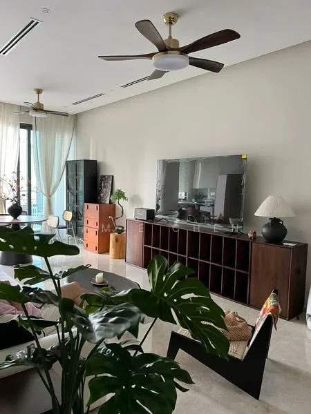 Living features: 5-blade ceiling fan with integrated LED light, wall-mounted TV, dark wood TV console, light-colored walls, large windows with sheer curtains, cream-colored flooring, decorative table lamp, green indoor plants, wooden coffee table, black decorative vase, open shelving unit, wooden sideboard; style: modern; view: city.