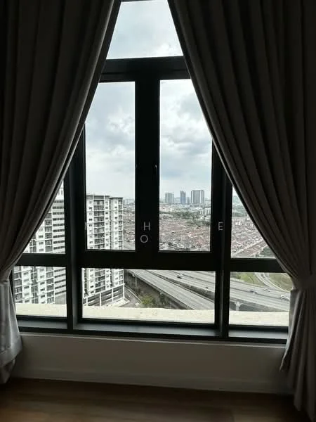 Room features: floor-to-ceiling windows, black window frames, curtains, city skyline view, high-rise buildings in view, highway visible, cloudy sky; style: modern; view: city.