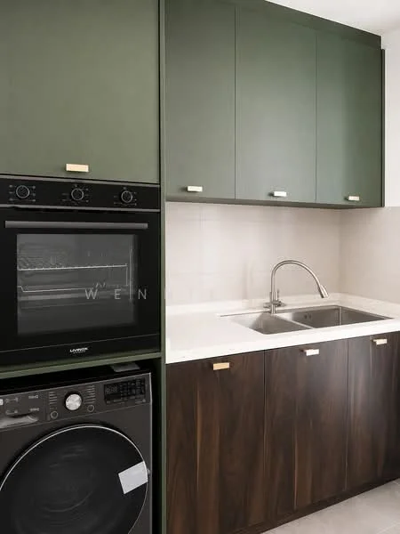 Laundry features: green cabinetry, dark wood cabinetry, stainless-steel sink, chrome faucet, built-in oven, front-load washing machine, white countertop, tile backsplash; style: modern.