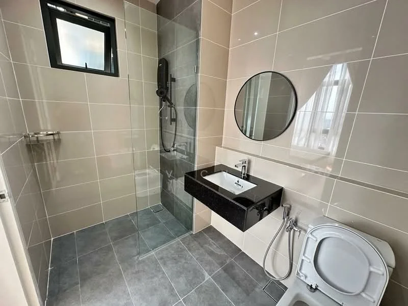 Bathroom features: grey ceramic tile flooring, beige wall tiles, black granite wall-mounted sink, chrome basin mixer faucet, round frameless mirror, walk-in shower with glass enclosure, rain shower head, handheld shower, one-piece toilet, wall-mounted shower controls, towel bar, window for natural light; style: modern.