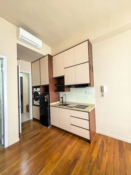 Kitchen features: brown and cream cabinetry, black refrigerator, built-in oven, stainless-steel sink, chrome pull-down faucet, ceramic cooktop, ventilation hood, wall-mounted split AC, wooden flooring, light-colored walls; style: modern.