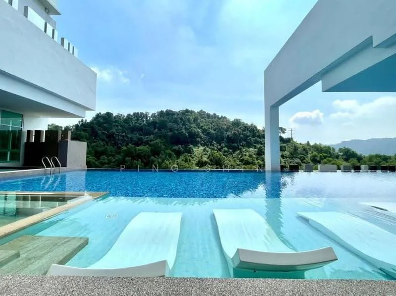 Exterior type: swimming pool deck; features: infinity pool, pool deck with loungers, surrounded by greenery, mountain view in background, modern architectural design, clear blue sky, sun loungers, water feature, glass railing; style: modern.