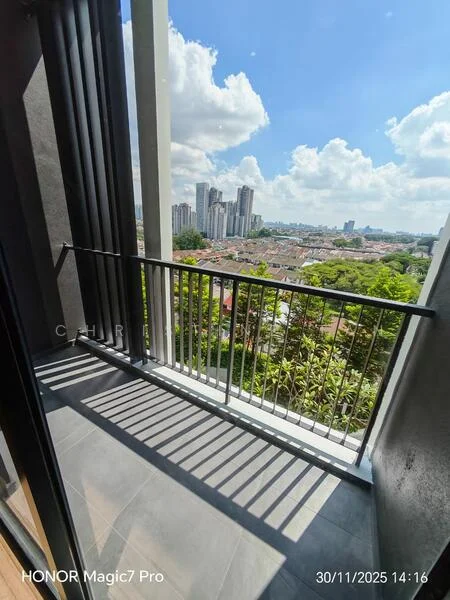 Room features: balcony with railing, city skyline view, grey tiled flooring, glass sliding door, outdoor greenery, sunlight casting shadows; style: modern; view: city.