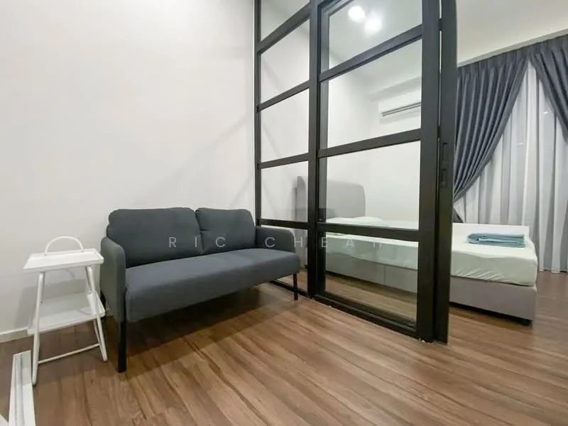 Room features: grey fabric sofa, white side table, wooden flooring, glass partition, curtains, bed with light-colored bedding, air conditioning unit, recessed ceiling lights; style: modern.