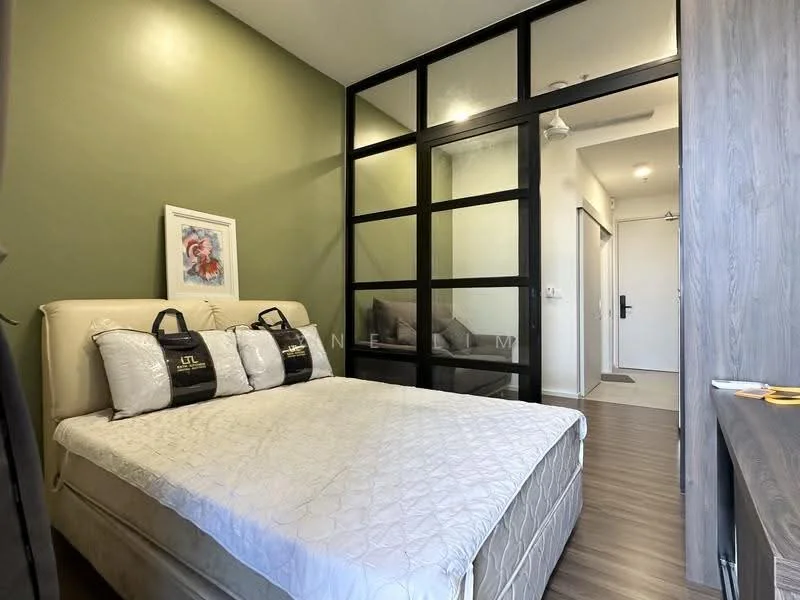Bedroom features: queen-size bed with upholstered headboard, white bedding, green painted walls, glass partition wall, wooden flooring, nightstand with drawer, wall-mounted light fixture, decorative artwork, sliding door to hallway; style: modern.