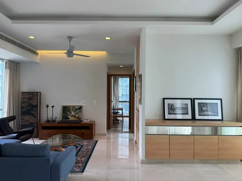 Living features: 3-seater fabric sofa in blue, wooden coffee table, TV console with drawers, framed artwork on walls, area rug with geometric pattern, ceiling fan, floor-to-ceiling windows, light-colored walls, marble tile flooring, recessed lighting, decorative plants in ceramic pots; style: modern; view: city. Room features: wooden door leading to another room, light-colored walls, marble tile flooring.