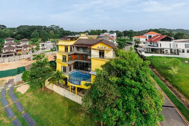 Exterior type: detached bungalow; features: yellow painted facade, flat roof, swimming pool, manicured lawn, surrounded by mature greenery, multiple storeys, balcony with glass railing, driveway, landscaped garden; style: modern.