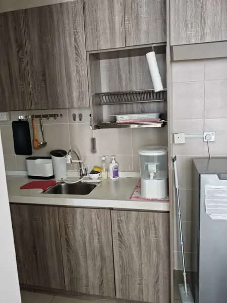 Kitchen features: laminate cabinetry in wood finish, white countertop, single-bowl stainless-steel sink, chrome pull-down faucet, built-in microwave, dishwasher, kitchen utensils hanging on wall, soap dispenser, water filter, tile backsplash, refrigerator, floor tiles; style: modern.