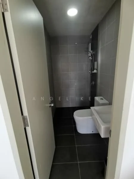 Bathroom features: grey tiled walls, dark grey tiled flooring, white toilet, white sink, shower with glass partition, chrome shower head, chrome faucet, recessed ceiling light; style: modern.
