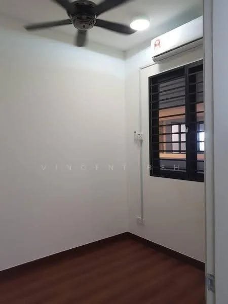 Room features: white painted walls, wooden flooring, ceiling fan, wall-mounted split AC, black window with grilles, natural light from window.