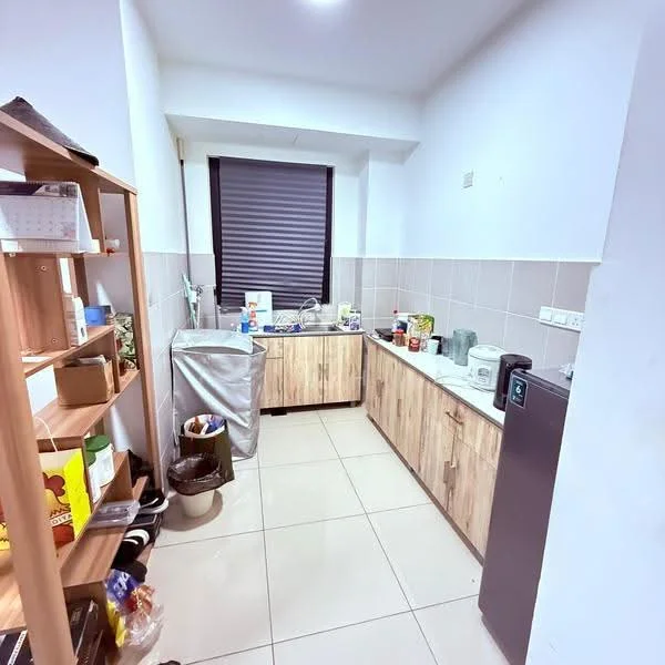 Kitchen features: laminate cabinetry in light wood finish, single-bowl stainless-steel sink, chrome pull-down faucet, countertop with beige tiles, built-in microwave, freestanding fridge, kitchen appliances including kettle and toaster, window with black roller blinds, tile flooring in cream, open shelving unit, trash bin, various kitchen items on countertop; style: modern.