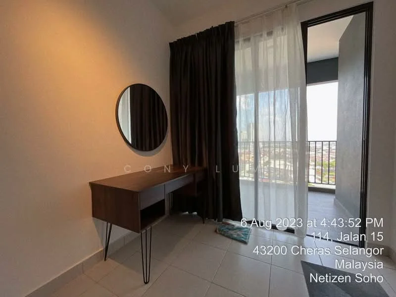 Room features: floor-to-ceiling windows, curtains, round mirror, wooden desk, tile flooring, balcony door, city view, neutral wall color; style: modern; view: city.