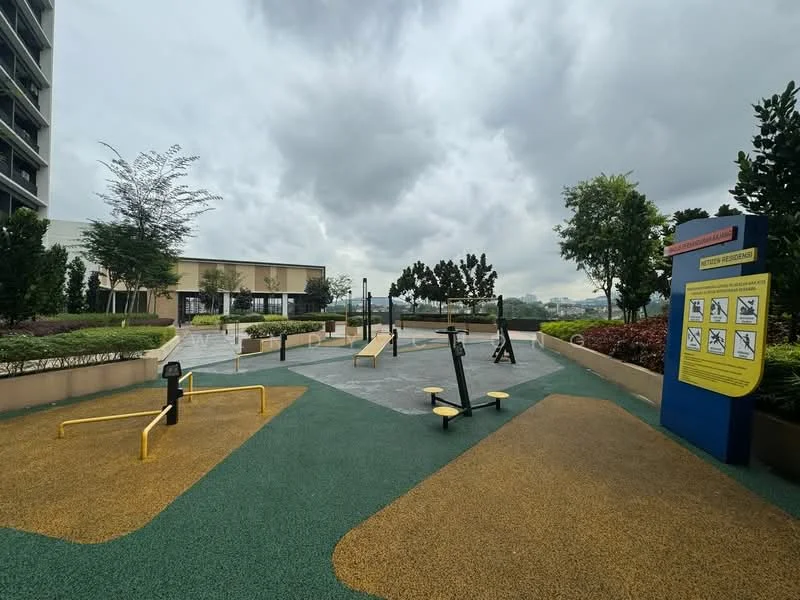 Exterior type: landscape garden; features: outdoor gym equipment, rubberized flooring, manicured landscaping, exercise stations, signage with instructions, surrounding greenery, paved walkways, benches, water feature, open space; style: modern.