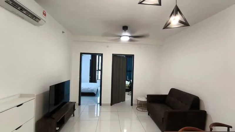Living features: white painted walls, glossy tile flooring, 5-blade ceiling fan with light, sofa in dark brown fabric, TV console, wall-mounted TV, coffee table, decorative light fixtures; style: modern. Room features: doorway leading to bedroom, doorway leading to hallway.