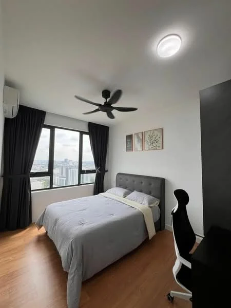 Bedroom features: king-size bed with grey upholstered headboard, grey bedding, 2 bedside lamps, black study desk, black office chair, floor-to-ceiling windows, black curtains, wooden flooring, ceiling fan with 3 blades, recessed ceiling light, air conditioning unit; style: modern; view: city.