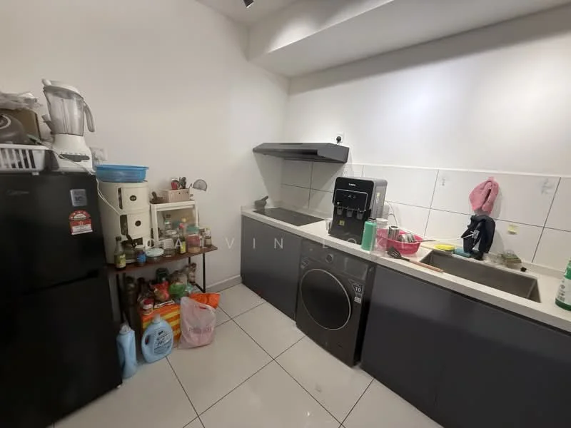 Kitchen features: single-bowl stainless-steel sink, chrome pull-down faucet, grey cabinetry, white tiled backsplash, built-in oven, freestanding washing machine, black refrigerator, blender, kettle, various kitchen utensils and condiments, countertop with space for food preparation, white walls, tile flooring; style: modern.