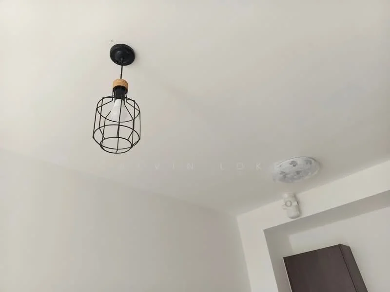 Room features: white painted ceiling, black pendant light with cage design, ceiling-mounted smoke detector, wall-mounted light fixture, neutral wall color, built-in cabinetry; style: modern.