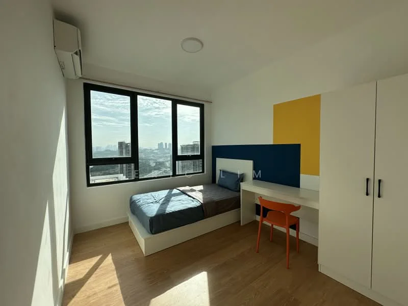 Bedroom features: single bed with blue bedding, study desk with chair, white wardrobe, floor-to-ceiling windows, city view, wooden flooring, wall-mounted air conditioning unit, accent wall in blue and yellow, recessed ceiling light; style: modern; view: city.