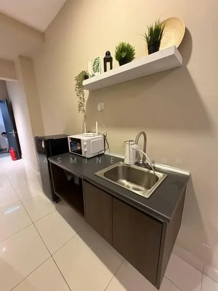 Room features: black countertop, brown cabinetry, single-bowl stainless-steel sink, chrome pull-down faucet, microwave, mini fridge, decorative plants on shelf, white wall shelf, white wall, glossy tile flooring; style: modern.