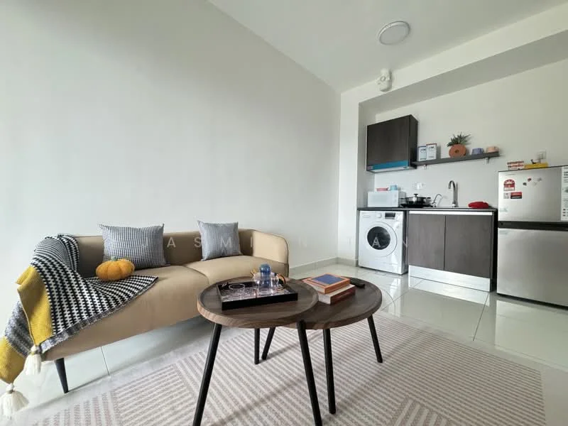 Living features: beige fabric sofa, grey throw pillows, black and white patterned throw blanket, round wooden coffee table, area rug with geometric pattern, wall-mounted TV, white painted walls, recessed ceiling lights, large window with natural light, floor tiles, washing machine, stainless-steel fridge, kitchen countertop, kitchen cabinets; style: modern.