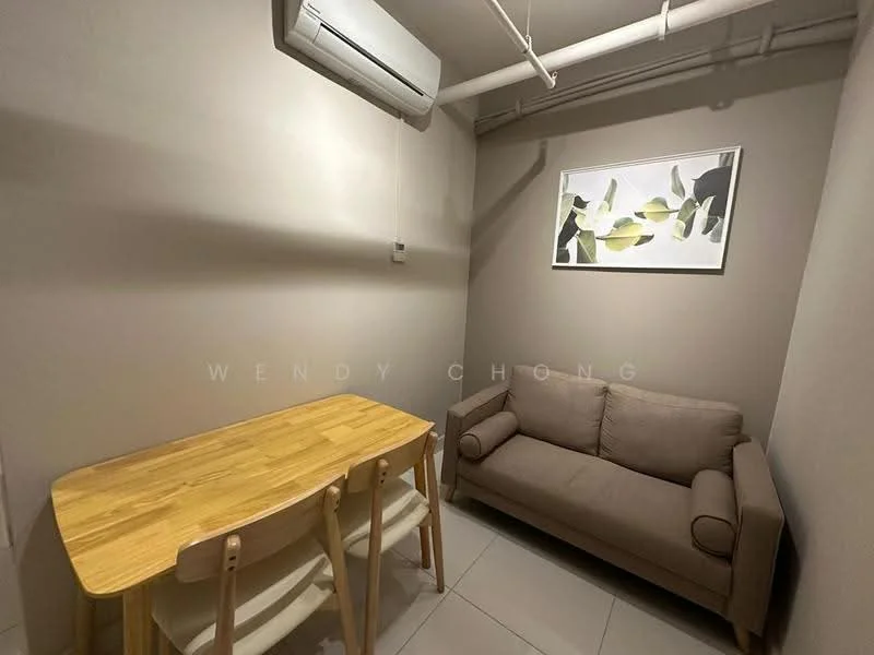 Room features: light grey painted walls, white ceiling, 2-seater fabric sofa in beige, wooden dining table with 2 chairs, wall-mounted split AC, tile flooring, framed artwork on wall; style: modern.