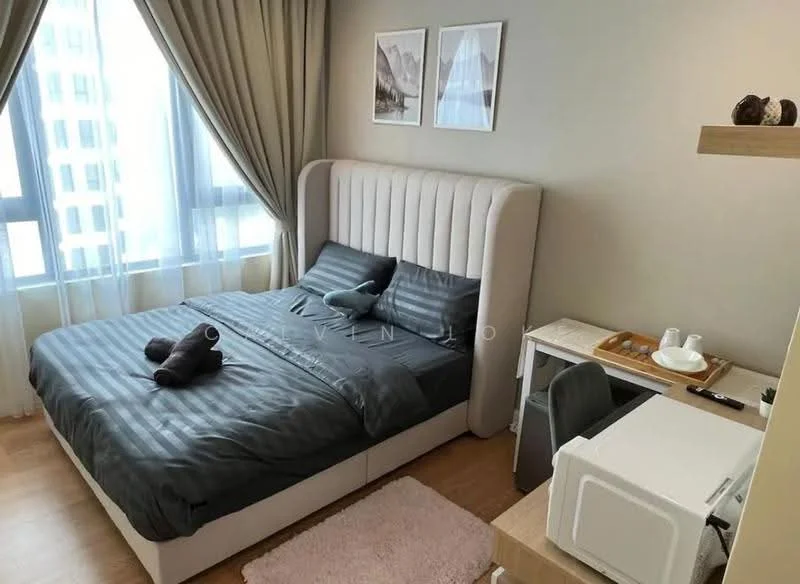 Bedroom features: king-size bed with upholstered headboard, grey bedding, two brown towels on bed, wooden flooring, floor-to-ceiling windows, sheer curtains, decorative wall art, study desk with chair, microwave, tea set, area rug, wall-mounted shelf; style: modern; view: city.