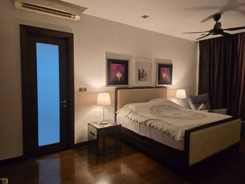 Bedroom features: king-size bed with upholstered headboard, white bedding with decorative throw, 2 bedside lamps, wooden bedside table, dark wood flooring, floor-to-ceiling curtains, ceiling fan, framed artwork on walls, glass door with wooden frame; style: modern.