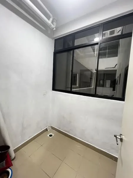 Room features: white painted walls, tile flooring, large black-framed windows, floor drain, exposed pipes, neutral color scheme.