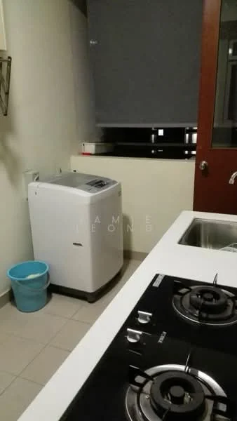 Kitchen features: white washing machine, stainless-steel sink, 4-burner gas hob, grey tiled flooring, wall-mounted window with roller blinds, white walls, kitchen countertop, blue plastic bucket.