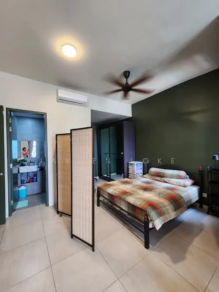 Bedroom features: king-size bed with plaid bedding, 2-panel wooden room divider, 1 wall-mounted split AC, 5-blade ceiling fan, green accent wall, light beige walls, tile flooring, built-in wardrobe, window with sheer curtains, decorative shelving unit; style: modern. Bathroom features: toilet, sink with mirror, shower area, blue storage containers, tiled walls, tile flooring.