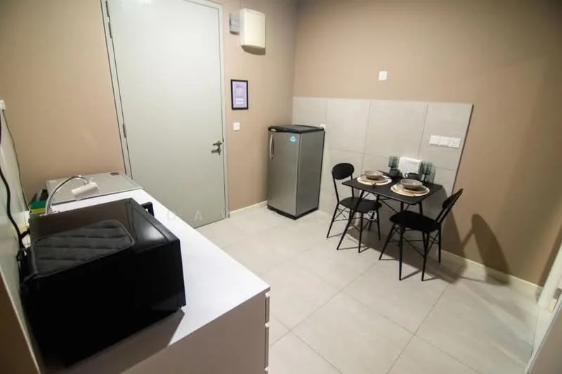 Kitchen features: grey painted walls, white tiled flooring, white cabinetry, stainless-steel fridge, microwave, black dining table, 4 black dining chairs, countertop, wall-mounted light fixture; style: modern.