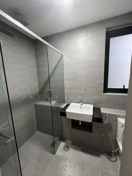Bathroom features: grey tiled walls, grey tiled flooring, glass shower enclosure, wall-mounted sink, black countertop, toilet, window with black frame, showerhead, handheld shower, chrome faucet, towel rail; style: modern.