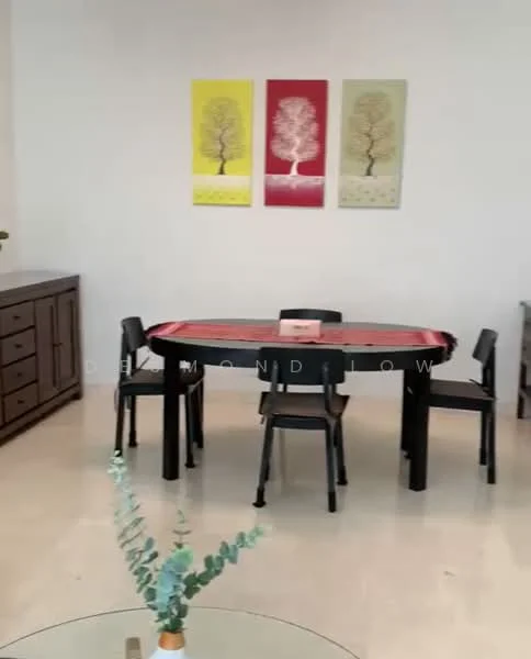 Dining features: round dining table, black dining chairs, wooden sideboard, decorative wall art with trees, cream painted walls, marble flooring, glass coffee table, greenery in vase; style: modern.