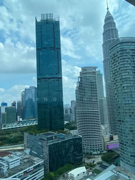 Exterior type: high-rise condominium; features: glass curtain wall facade, approximately 30-storey high-rise, surrounded by urban skyline, visible cityscape, modern architectural design, adjacent to commercial buildings, clear blue sky, tall skyscrapers in background; style: modern.
