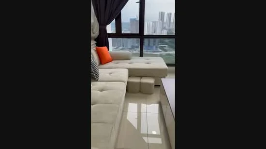 Living features: L-shape sectional sofa in light fabric, orange accent cushion, glass coffee table, floor-to-ceiling windows, city skyline view, white tiled flooring, curtains, decorative throw pillows; style: modern; view: city.