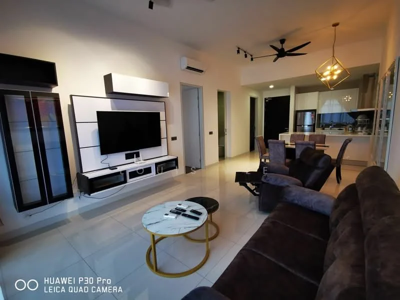 Living features: 3-seater fabric sofa in dark brown, 2-seater fabric sofa in dark brown, round coffee table with white top and gold legs, wall-mounted TV, TV console with storage, ceiling fan with light, recessed LED downlights, white painted walls, glossy tile flooring, air conditioning unit, decorative pendant light; style: modern.