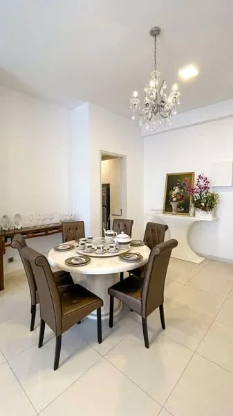 Dining features: round marble dining table, 6 upholstered dining chairs in brown, chandelier with multiple bulbs, white painted walls, ceramic tile flooring, decorative wall art with floral design, sideboard with glassware, open layout to adjacent room; style: modern.