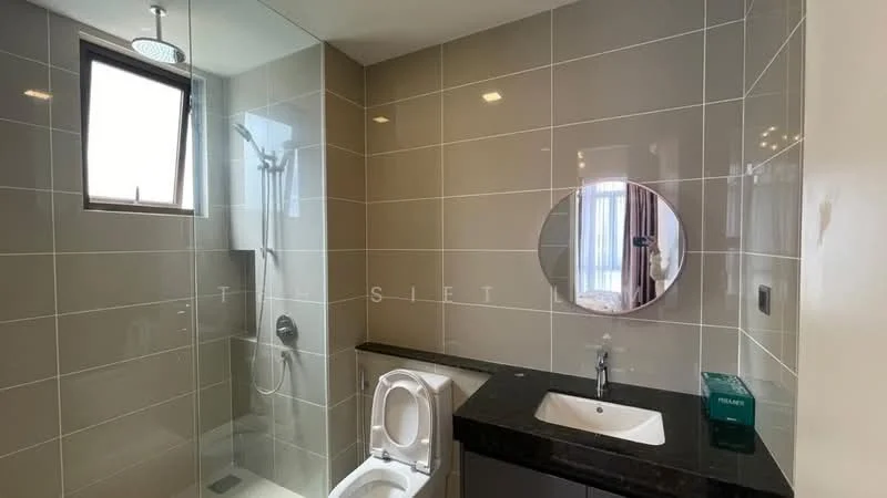 Bathroom features: grey tiled walls, white ceramic floor tiles, single-sink vanity with black countertop, chrome basin mixer faucet, framed mirror, one-piece toilet, walk-in shower with glass enclosure, rain shower head, handheld shower, window for natural light, recessed lighting; style: modern.