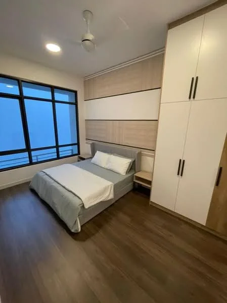 Bedroom features: queen-size bed, upholstered headboard, bedside table, built-in wardrobe with white doors, wooden flooring, ceiling fan, large windows with black frames, neutral wall color, decorative wall paneling; style: modern.