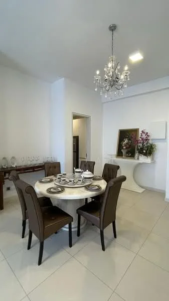 Dining features: round dining table with marble top, 6 upholstered dining chairs in brown, chandelier with multiple bulbs, white painted walls, cream tiled flooring, decorative artwork on wall, sideboard with glassware, floral arrangement on side table; style: modern.