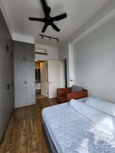 Bedroom features: queen-size bed with mattress, wooden flooring, grey built-in wardrobe with sliding doors, ceiling fan, track lighting, brown leather armchair, white walls, door leading to bathroom, window with natural light; style: modern.