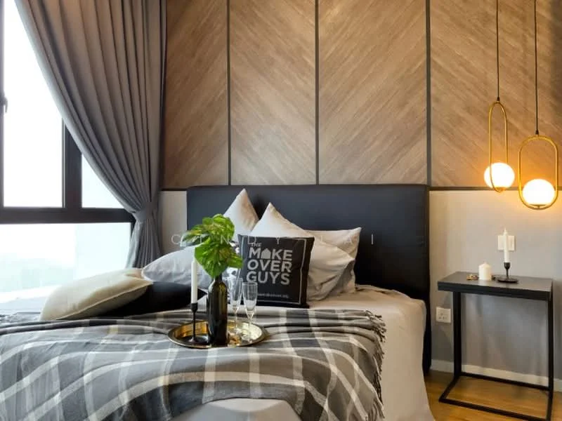 Bedroom features: king-size bed, black upholstered headboard, plaid throw blanket, decorative pillows, wood accent wall with herringbone pattern, floor-to-ceiling windows, curtains in grey, side table with lamp, decorative tray with bottles, candle on side table, wooden flooring; style: modern; view: city.