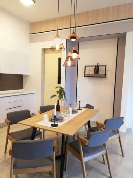 Dining features: wooden dining table, 6 upholstered dining chairs in grey, pendant lights with geometric design, white cabinetry, grey tiled backsplash, open shelving, decorative wall art, ceramic candle holders, table setting with plates and cutlery, indoor plant; style: modern. Kitchen features: white cabinets, grey countertops, built-in oven, stainless-steel sink, chrome faucet; style: modern.