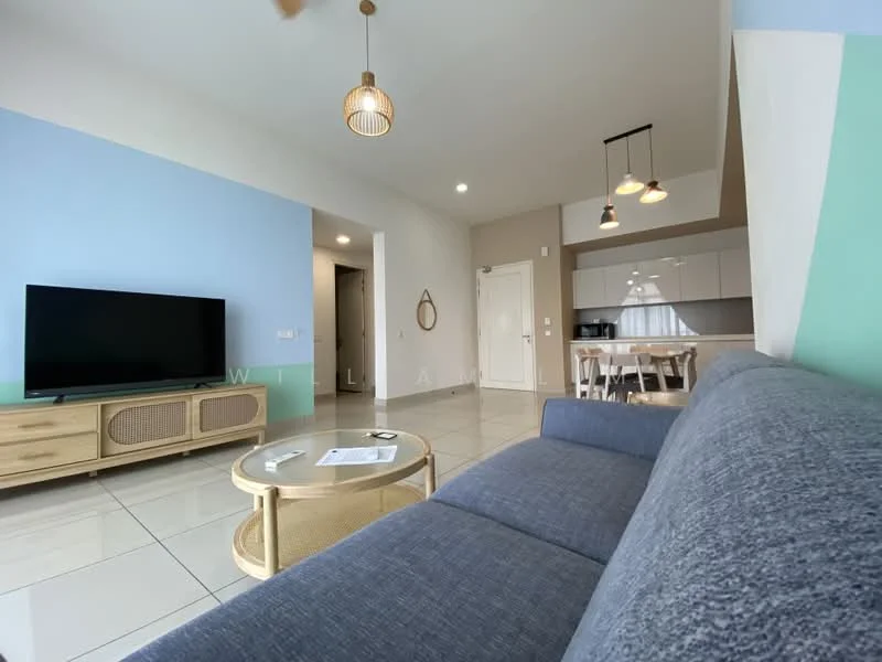 Living features: grey fabric sofa, round coffee table with rattan base, wall-mounted TV, light wood TV console, pendant lighting with three bulbs, white walls, blue accent wall, large windows with natural light, ceramic tile flooring, ceiling fan, dining area visible in background, open layout; style: modern.