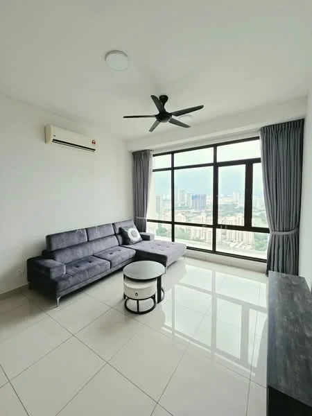 Living features: grey fabric sectional sofa, round coffee table with black and white design, floor-to-ceiling windows, city view, white painted walls, glossy tile flooring, 1 wall-mounted split AC, 5-blade ceiling fan with light, curtains in grey fabric, decorative cushion; style: modern; view: city.