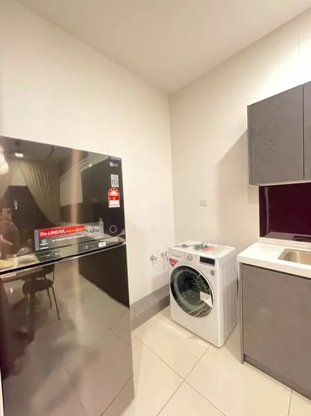Laundry features: stainless-steel fridge, front-load washing machine, grey cabinetry, white countertop, white tiled flooring, white painted walls, single-bowl stainless-steel sink, modern faucet; style: modern.